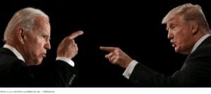 Two hands pointing to each other in a black background